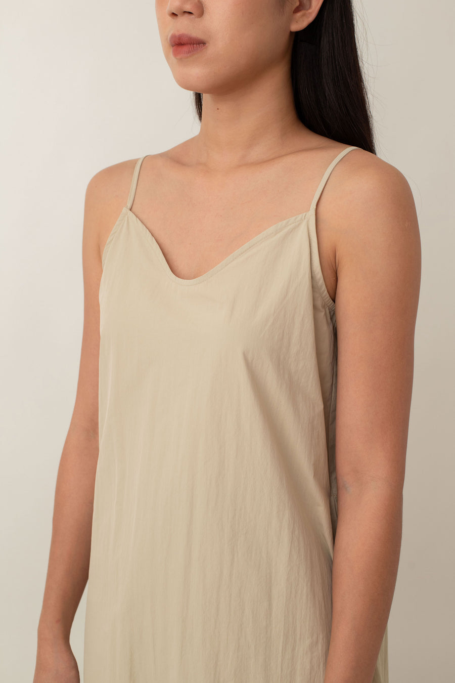 Made from lightweight, breathable fabric, the Jocelyn top is perfect for easy, breezy days. With its delicate spaghetti straps and flattering V-neckline, it adds a touch of femininity to any outfit. The neutral color exudes an earthy vibe that pairs well with just about anything.