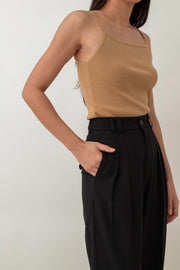 Lysandra features a flattering high-waist design with a straight-leg cut that’s both stylish and comfortable. The best part? They’re wrinkle-free, so there’s no need to iron when you’re busy, making them perfect for on-the-go lifestyles. Plus, they come with handy side pockets for added convenience, so you can easily carry your essentials.