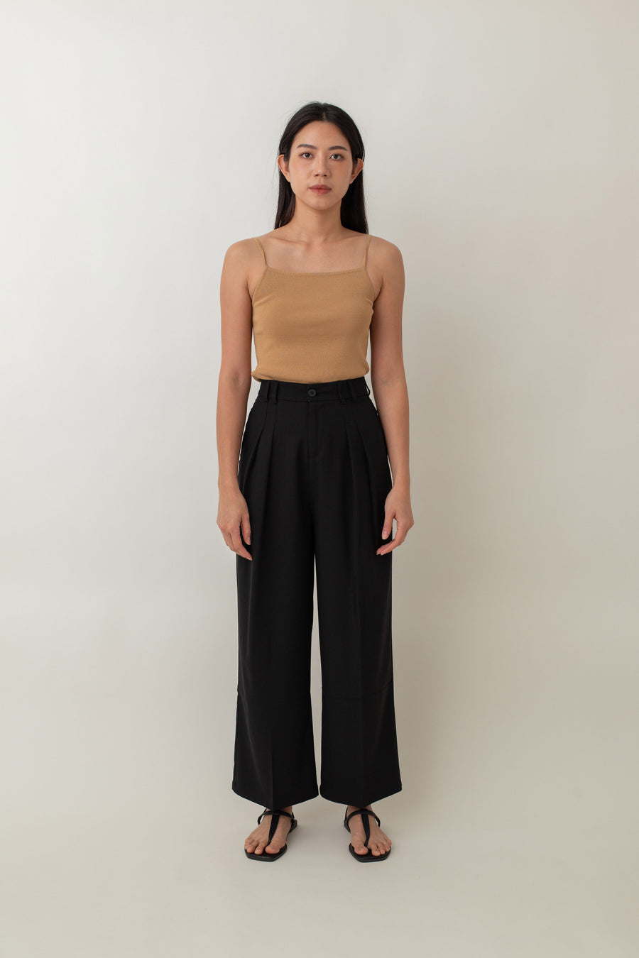 Lysandra features a flattering high-waist design with a straight-leg cut that’s both stylish and comfortable. The best part? They’re wrinkle-free, so there’s no need to iron when you’re busy, making them perfect for on-the-go lifestyles. Plus, they come with handy side pockets for added convenience, so you can easily carry your essentials.