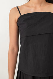 Sleek, modern, and super comfy! The Noelle Camisole Top has a draped front for a stylish twist, and the fitted bust flares out just enough to give you an effortless vibe. Plus, with a back zipper, it's a breeze to slip on and off.