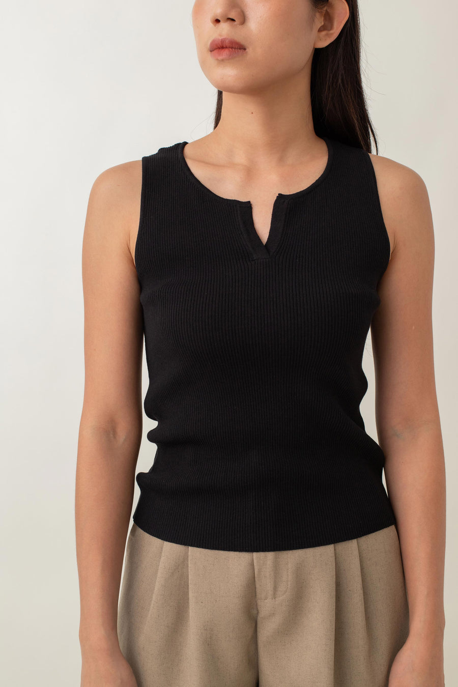 Olivia is your go-to for a chic, everyday look. With its ribbed texture and comfy stretch, this fitted top hugs your curves perfectly. The notched neckline adds a touch of flair, giving it a polished edge. Style it with jeans for a laid-back vibe or pair it with a skirt for a more dressed-up look.