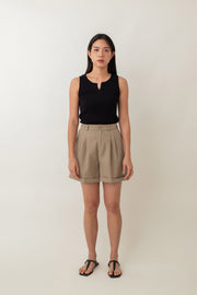 Olivia is your go-to for a chic, everyday look. With its ribbed texture and comfy stretch, this fitted top hugs your curves perfectly. The notched neckline adds a touch of flair, giving it a polished edge. Style it with jeans for a laid-back vibe or pair it with a skirt for a more dressed-up look.