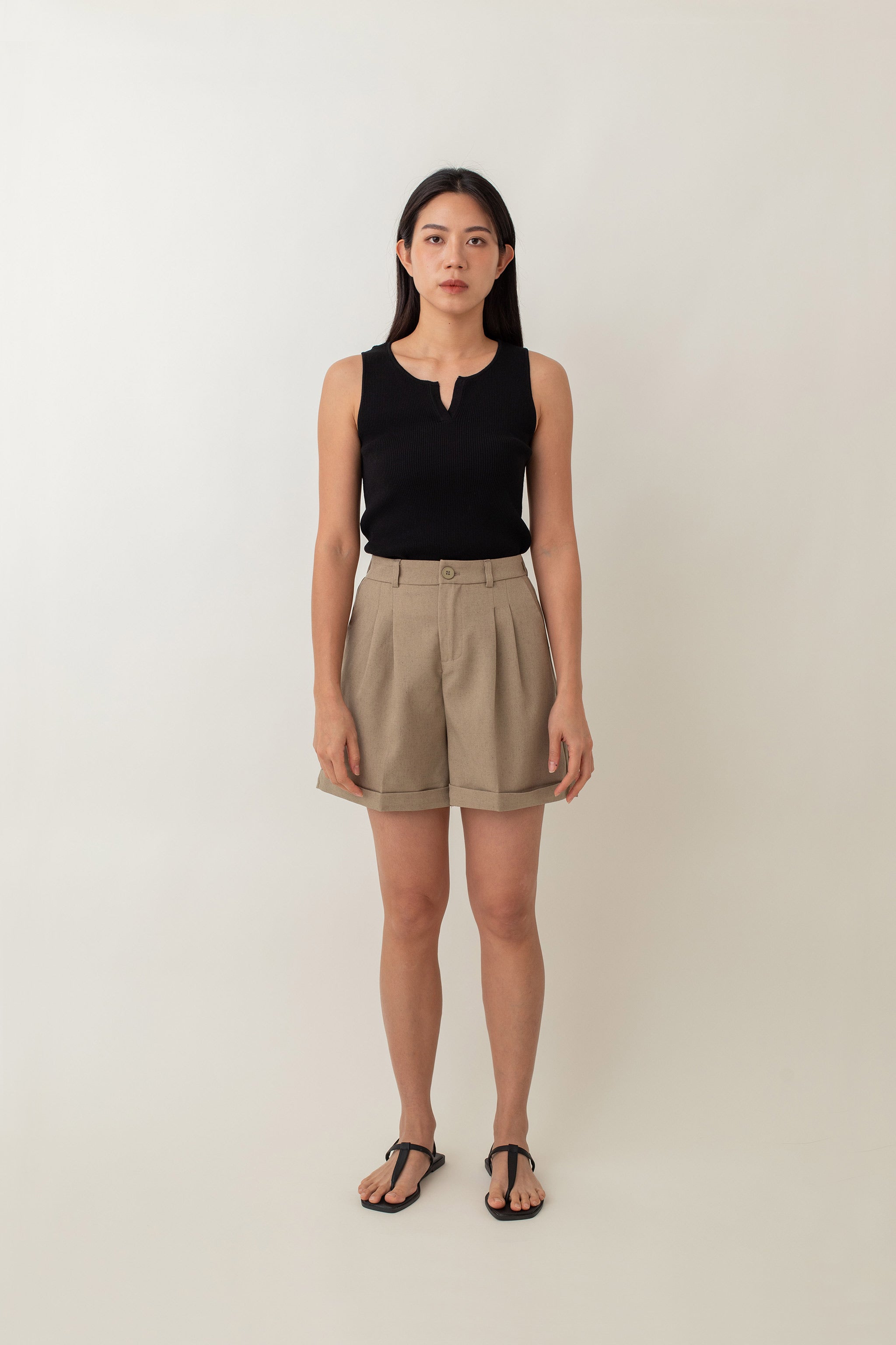 Olivia is your go-to for a chic, everyday look. With its ribbed texture and comfy stretch, this fitted top hugs your curves perfectly. The notched neckline adds a touch of flair, giving it a polished edge. Style it with jeans for a laid-back vibe or pair it with a skirt for a more dressed-up look.