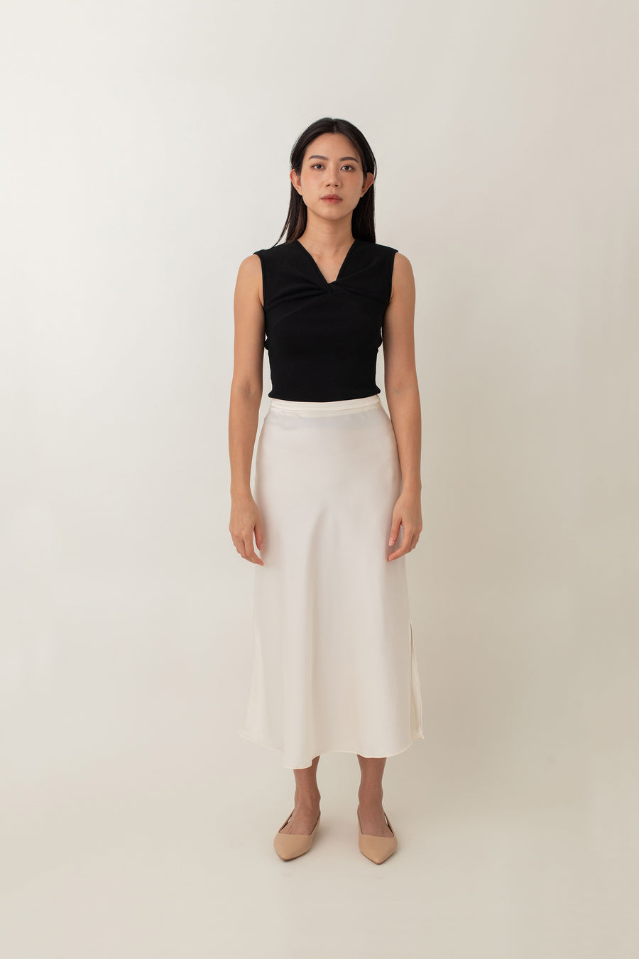 Xanthe is made from a soft, stretchy fabric that feels great and fits like a dream. That awesome knot detail at the front adds something extra to a classic style. Comfortable, stylish, and totally versatile -&nbsp;dress it up with high-waisted skirts or tailored pants for a sleek look, or keep it casual with your favourite jeans.