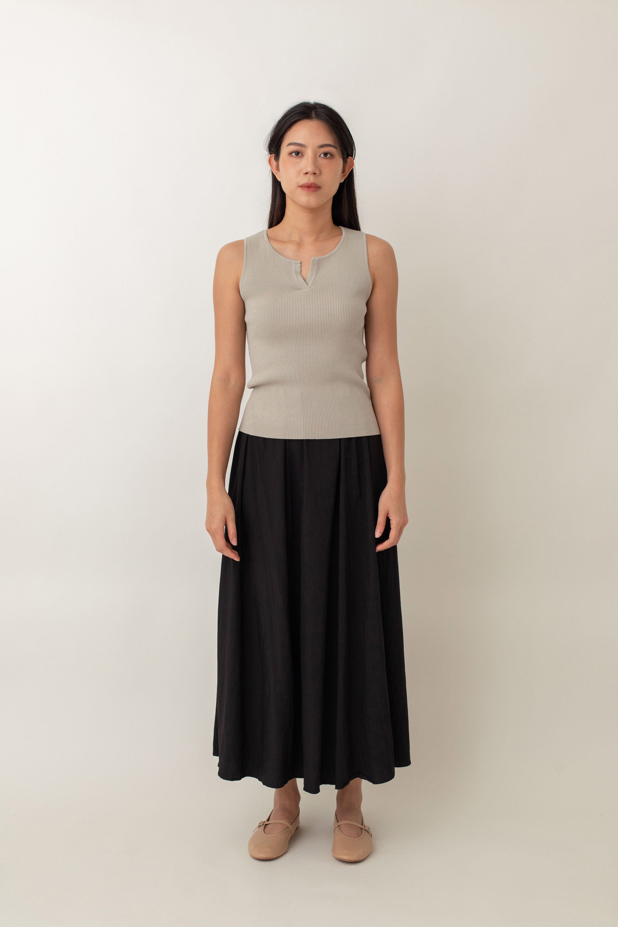 Olivia is your go-to for a chic, everyday look. With its ribbed texture and comfy stretch, this fitted top hugs your curves perfectly. The notched neckline adds a touch of flair, giving it a polished edge. Style it with jeans for a laid-back vibe or pair it with a skirt for a more dressed-up look.