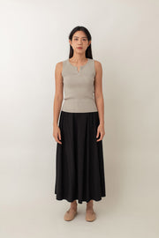 Olivia is your go-to for a chic, everyday look. With its ribbed texture and comfy stretch, this fitted top hugs your curves perfectly. The notched neckline adds a touch of flair, giving it a polished edge. Style it with jeans for a laid-back vibe or pair it with a skirt for a more dressed-up look.