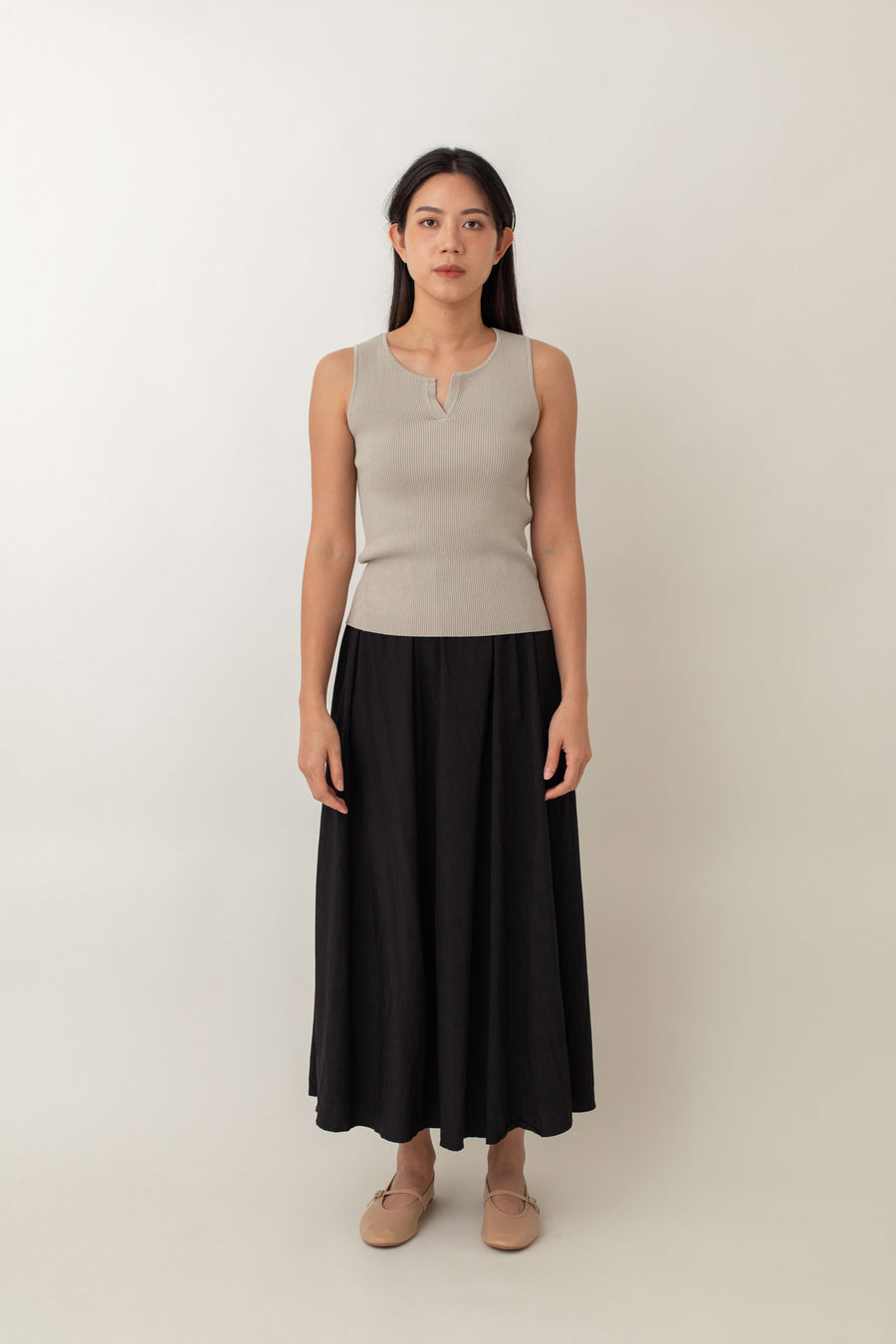 Olivia is your go-to for a chic, everyday look. With its ribbed texture and comfy stretch, this fitted top hugs your curves perfectly. The notched neckline adds a touch of flair, giving it a polished edge. Style it with jeans for a laid-back vibe or pair it with a skirt for a more dressed-up look.
