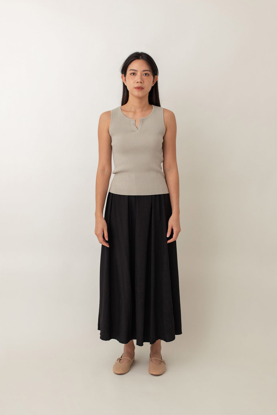 Olivia is your go-to for a chic, everyday look. With its ribbed texture and comfy stretch, this fitted top hugs your curves perfectly. The notched neckline adds a touch of flair, giving it a polished edge. Style it with jeans for a laid-back vibe or pair it with a skirt for a more dressed-up look.