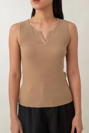 Olivia is your go-to for a chic, everyday look. With its ribbed texture and comfy stretch, this fitted top hugs your curves perfectly. The notched neckline adds a touch of flair, giving it a polished edge. Style it with jeans for a laid-back vibe or pair it with a skirt for a more dressed-up look.