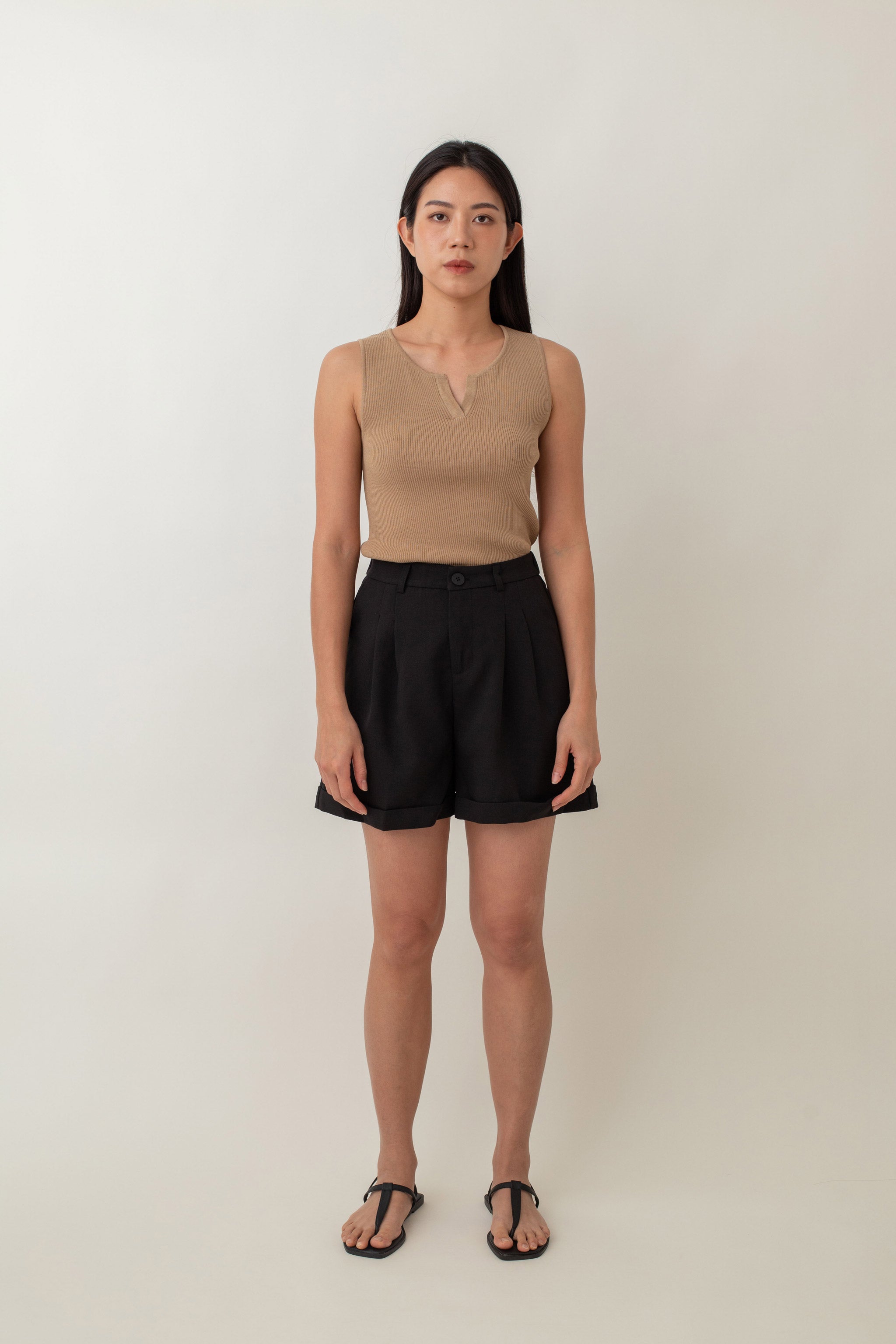 Olivia is your go-to for a chic, everyday look. With its ribbed texture and comfy stretch, this fitted top hugs your curves perfectly. The notched neckline adds a touch of flair, giving it a polished edge. Style it with jeans for a laid-back vibe or pair it with a skirt for a more dressed-up look.