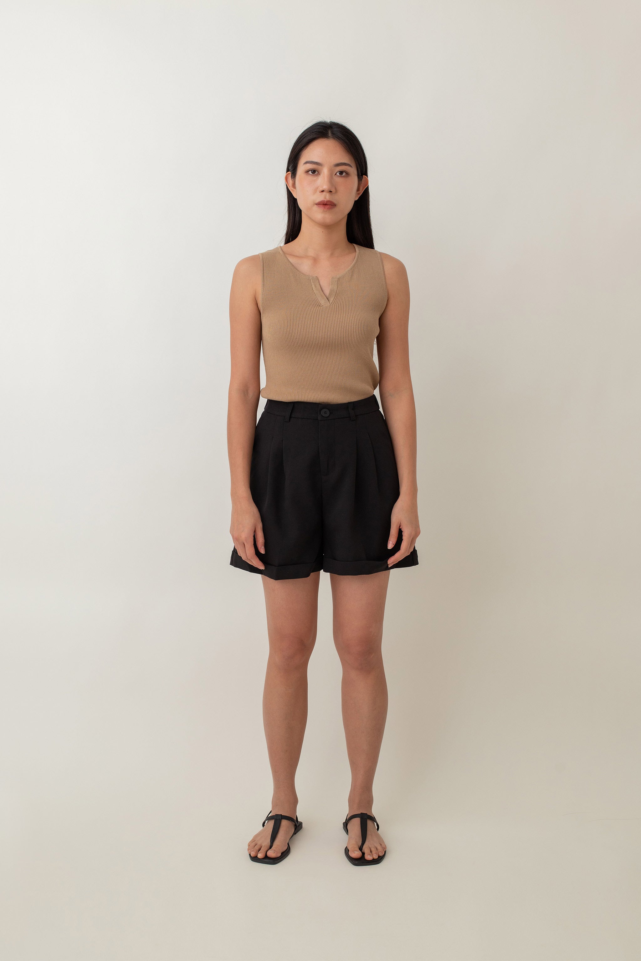 Olivia is your go-to for a chic, everyday look. With its ribbed texture and comfy stretch, this fitted top hugs your curves perfectly. The notched neckline adds a touch of flair, giving it a polished edge. Style it with jeans for a laid-back vibe or pair it with a skirt for a more dressed-up look.