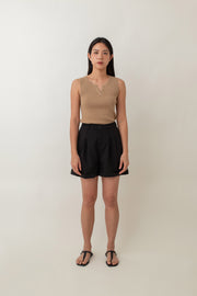 Olivia is your go-to for a chic, everyday look. With its ribbed texture and comfy stretch, this fitted top hugs your curves perfectly. The notched neckline adds a touch of flair, giving it a polished edge. Style it with jeans for a laid-back vibe or pair it with a skirt for a more dressed-up look.