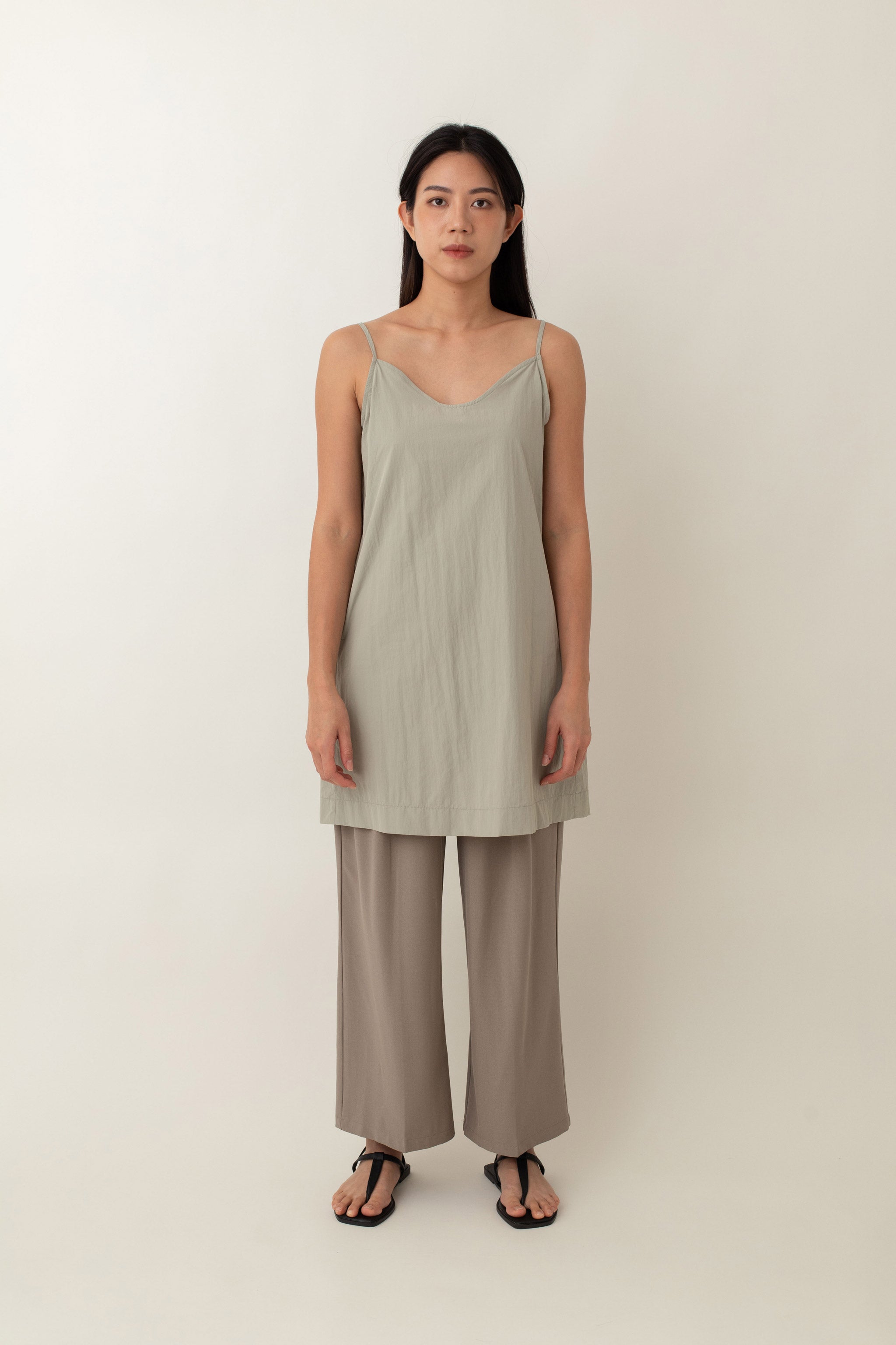 Made from lightweight, breathable fabric, the Jocelyn top is perfect for easy, breezy days. With its delicate spaghetti straps and flattering V-neckline, it adds a touch of femininity to any outfit. The neutral color exudes an earthy vibe that pairs well with just about anything.