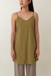 Made from lightweight, breathable fabric, the Jocelyn top is perfect for easy, breezy days. With its delicate spaghetti straps and flattering V-neckline, it adds a touch of femininity to any outfit. The neutral color exudes an earthy vibe that pairs well with just about anything.