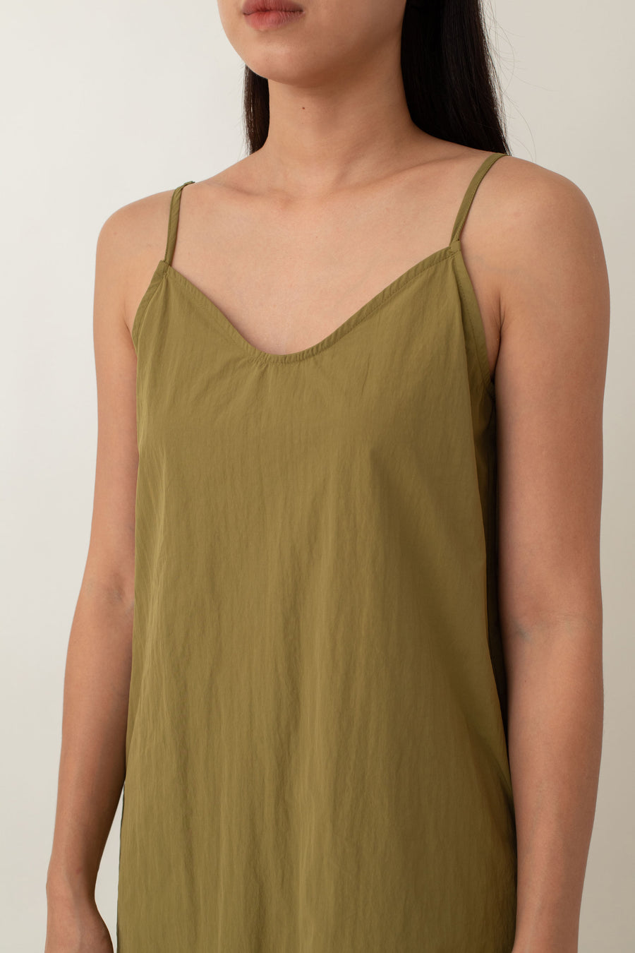 Made from lightweight, breathable fabric, the Jocelyn top is perfect for easy, breezy days. With its delicate spaghetti straps and flattering V-neckline, it adds a touch of femininity to any outfit. The neutral color exudes an earthy vibe that pairs well with just about anything.