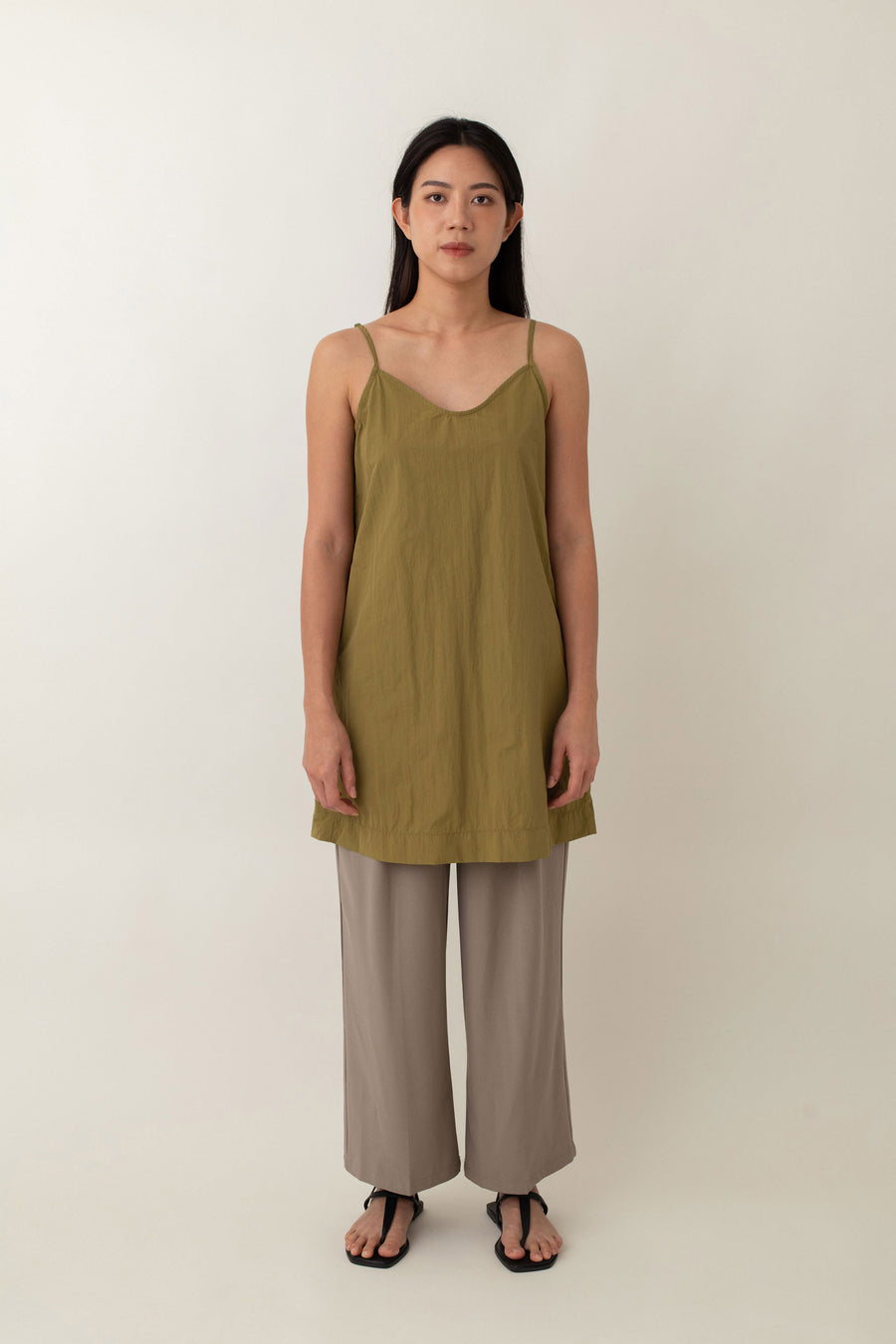 Made from lightweight, breathable fabric, the Jocelyn top is perfect for easy, breezy days. With its delicate spaghetti straps and flattering V-neckline, it adds a touch of femininity to any outfit. The neutral color exudes an earthy vibe that pairs well with just about anything.