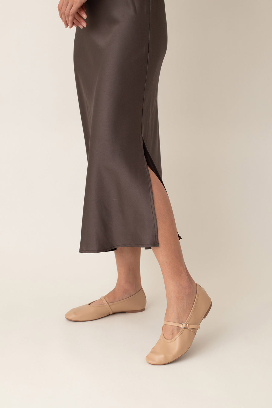 Crafted from silky fabric that feels smooth to the touch and features a subtle, beautiful sheen, the Thalia skirt flares gently from the waist. This design creates a flattering, flowy silhouette that moves gracefully with you.