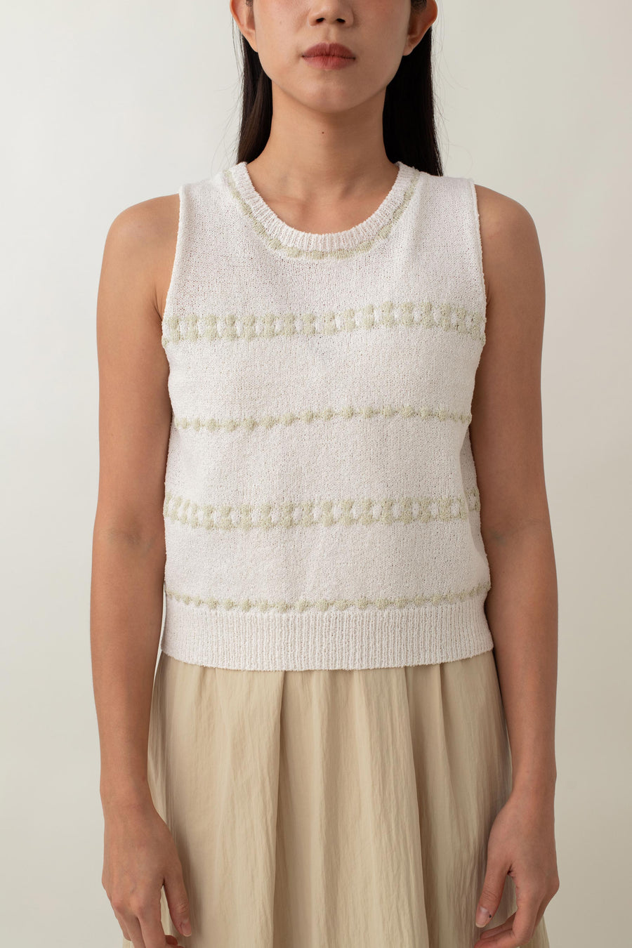 Whether you opt for the classic black or refreshing white, this Mia top effortlessly enhances any outfit with its delicate contrasting stripes. The cozy knit texture and relaxed fit provide all-day comfort, making it ideal for a laid-back yet chic style.