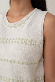 Whether you opt for the classic black or refreshing white, this Mia top effortlessly enhances any outfit with its delicate contrasting stripes. The cozy knit texture and relaxed fit provide all-day comfort, making it ideal for a laid-back yet chic style.
