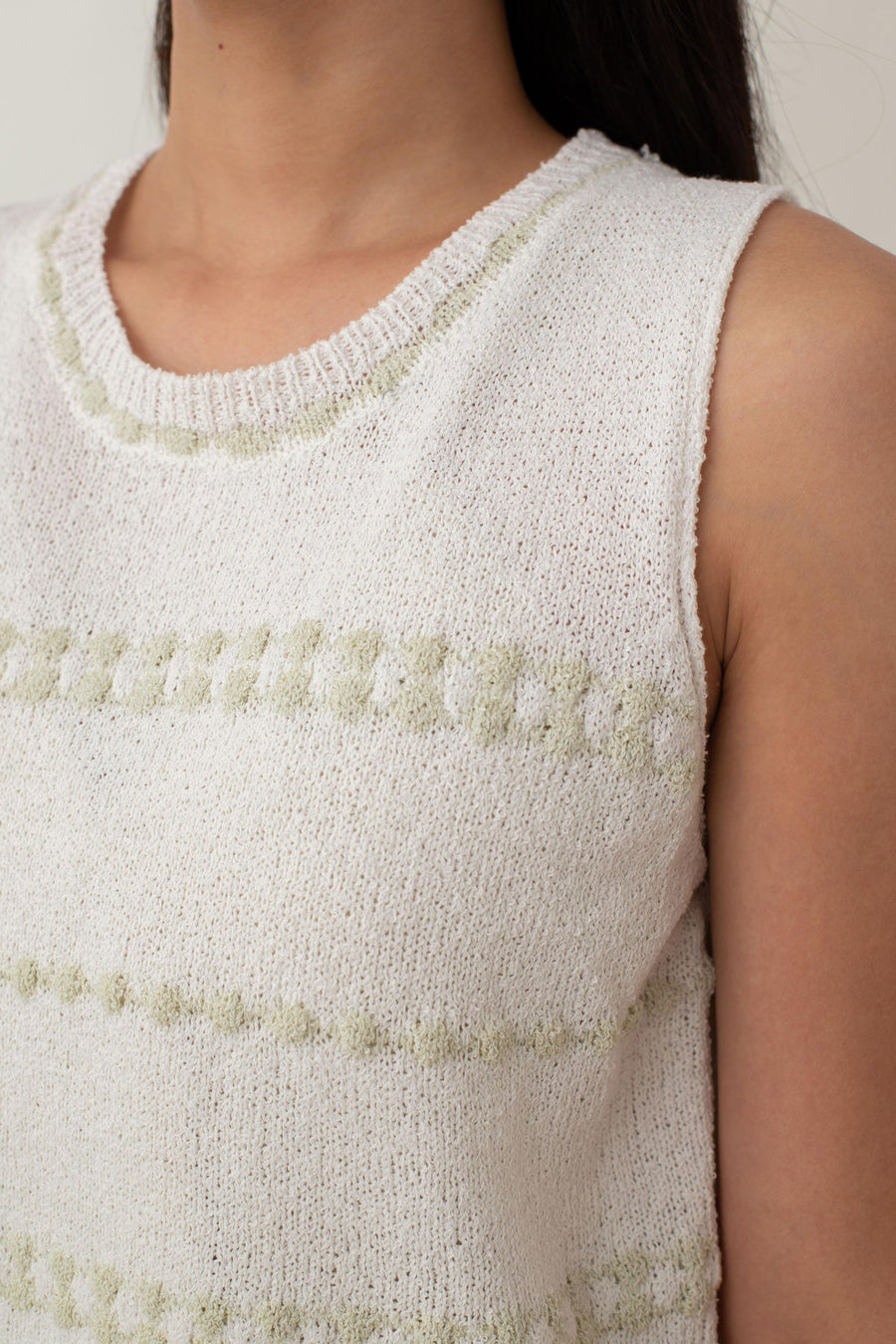 Whether you opt for the classic black or refreshing white, this Mia top effortlessly enhances any outfit with its delicate contrasting stripes. The cozy knit texture and relaxed fit provide all-day comfort, making it ideal for a laid-back yet chic style.