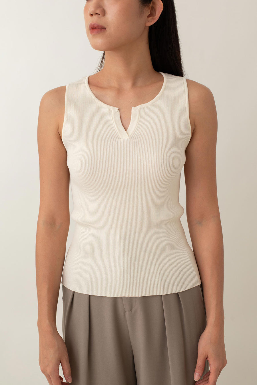 Olivia is your go-to for a chic, everyday look. With its ribbed texture and comfy stretch, this fitted top hugs your curves perfectly. The notched neckline adds a touch of flair, giving it a polished edge. Style it with jeans for a laid-back vibe or pair it with a skirt for a more dressed-up look.