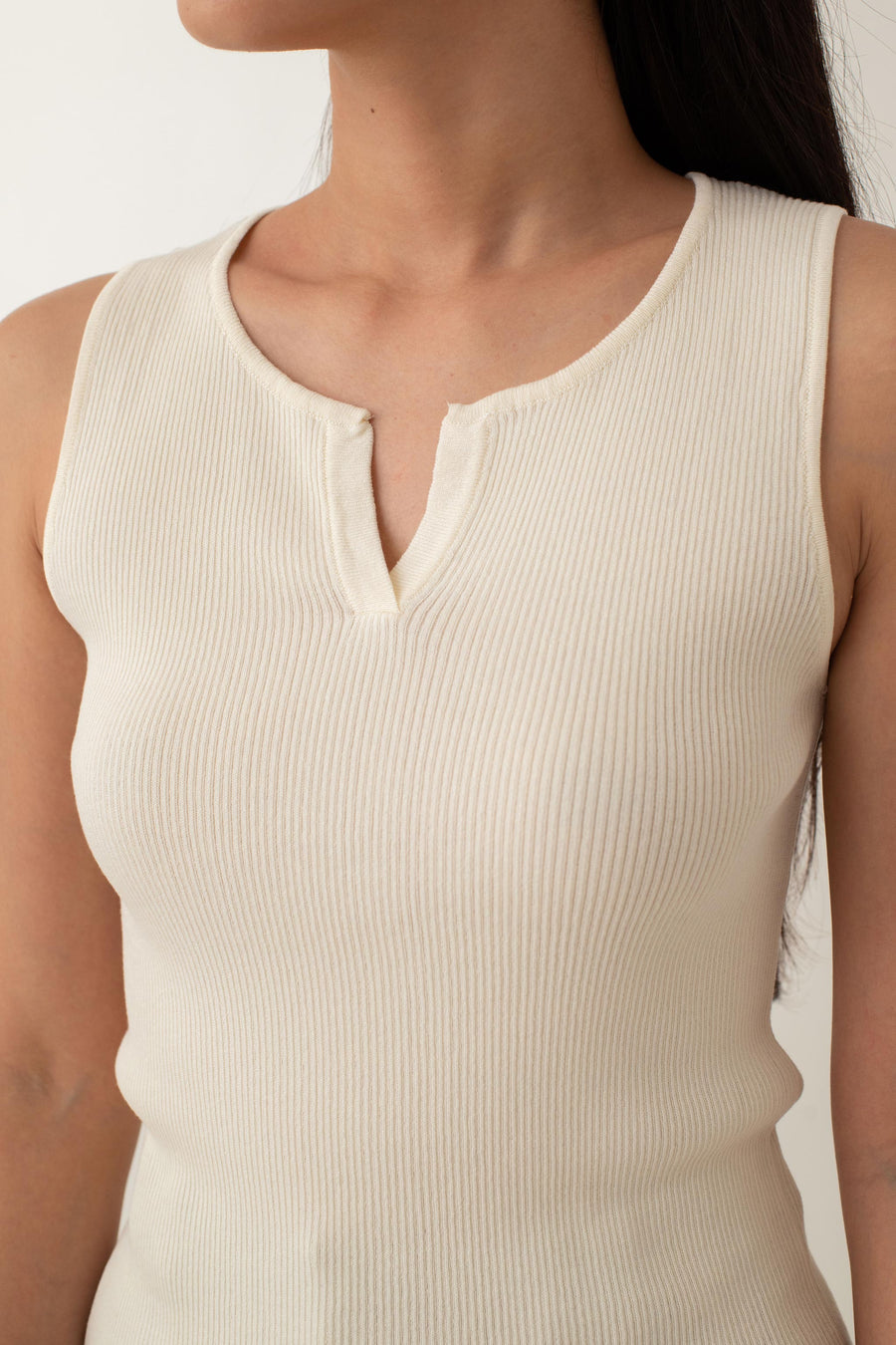 Olivia is your go-to for a chic, everyday look. With its ribbed texture and comfy stretch, this fitted top hugs your curves perfectly. The notched neckline adds a touch of flair, giving it a polished edge. Style it with jeans for a laid-back vibe or pair it with a skirt for a more dressed-up look.