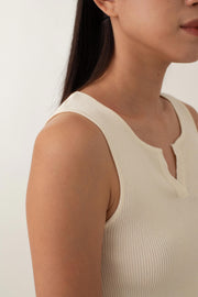 Olivia is your go-to for a chic, everyday look. With its ribbed texture and comfy stretch, this fitted top hugs your curves perfectly. The notched neckline adds a touch of flair, giving it a polished edge. Style it with jeans for a laid-back vibe or pair it with a skirt for a more dressed-up look.