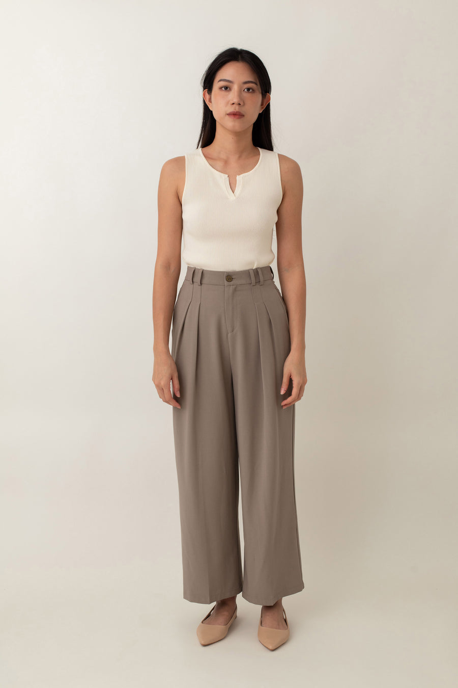 Olivia is your go-to for a chic, everyday look. With its ribbed texture and comfy stretch, this fitted top hugs your curves perfectly. The notched neckline adds a touch of flair, giving it a polished edge. Style it with jeans for a laid-back vibe or pair it with a skirt for a more dressed-up look.