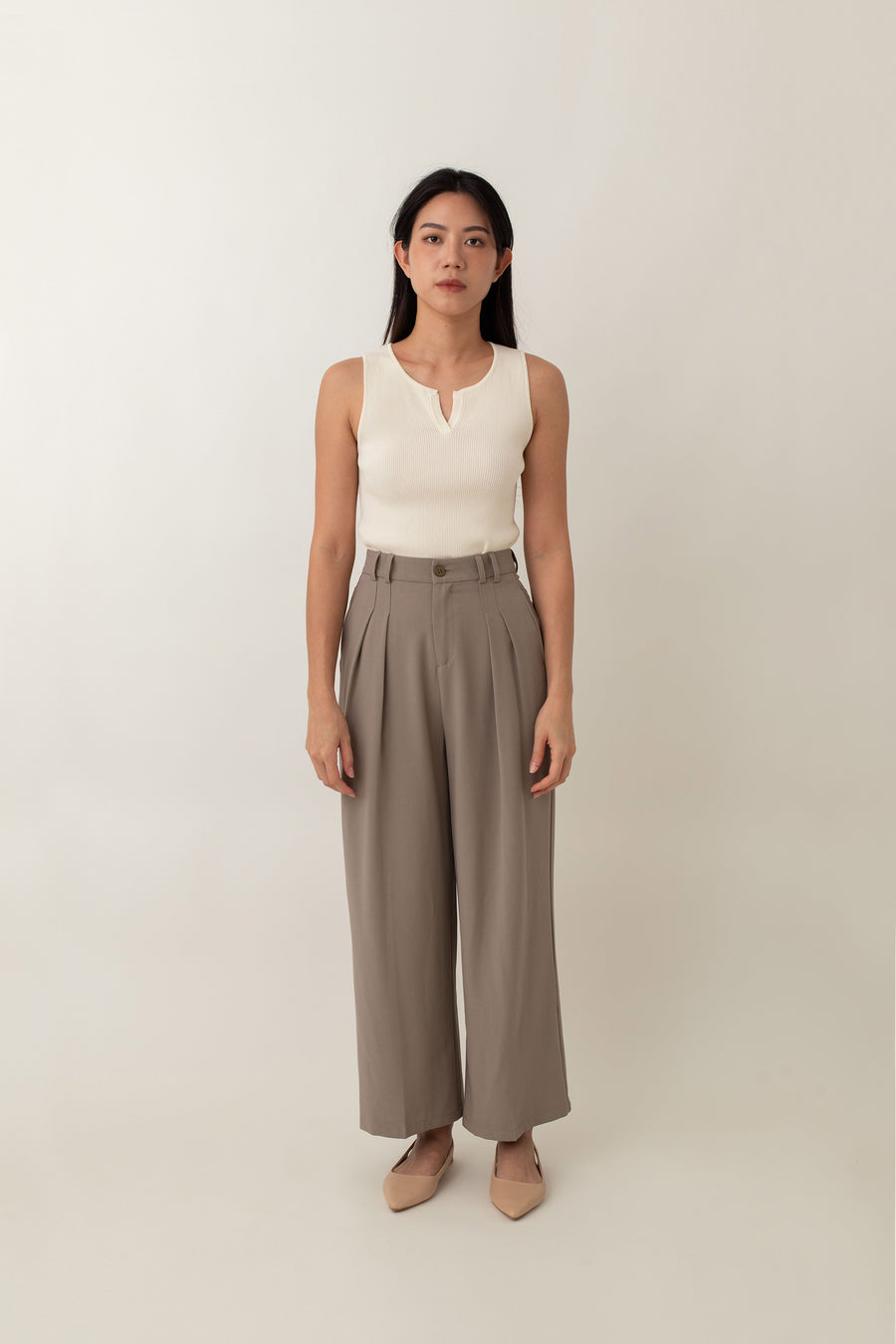 Olivia is your go-to for a chic, everyday look. With its ribbed texture and comfy stretch, this fitted top hugs your curves perfectly. The notched neckline adds a touch of flair, giving it a polished edge. Style it with jeans for a laid-back vibe or pair it with a skirt for a more dressed-up look.