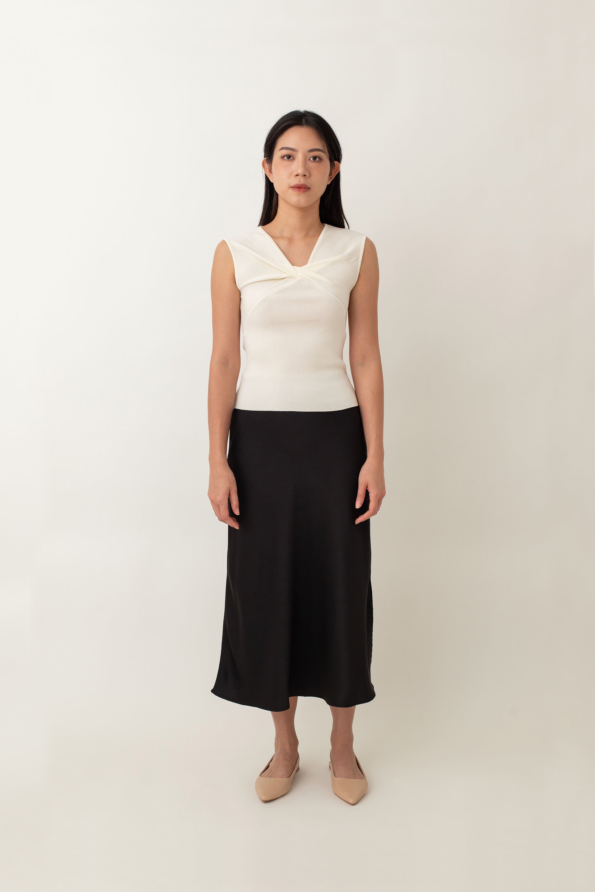 Xanthe is made from a soft, stretchy fabric that feels great and fits like a dream. That awesome knot detail at the front adds something extra to a classic style. Comfortable, stylish, and totally versatile -&nbsp;dress it up with high-waisted skirts or tailored pants for a sleek look, or keep it casual with your favorite jeans.
